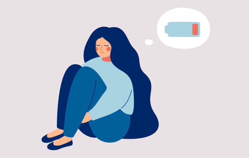 Employee mental health - woman sitting on the floor